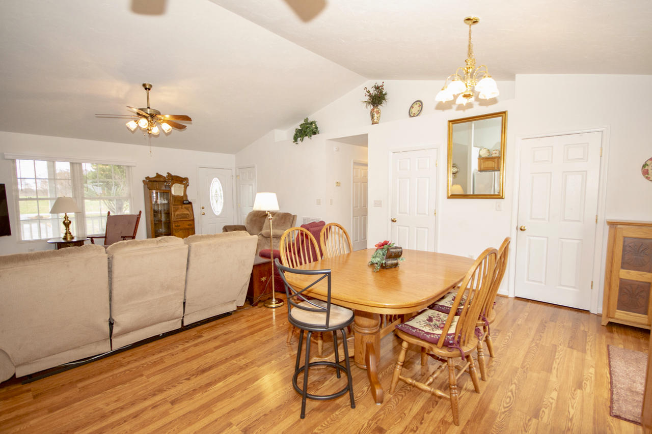 1857 Emmaus Church Road Moneta, VA 24121 - Photo 22 of 42 a view of a dining room with furniture and wooden floor