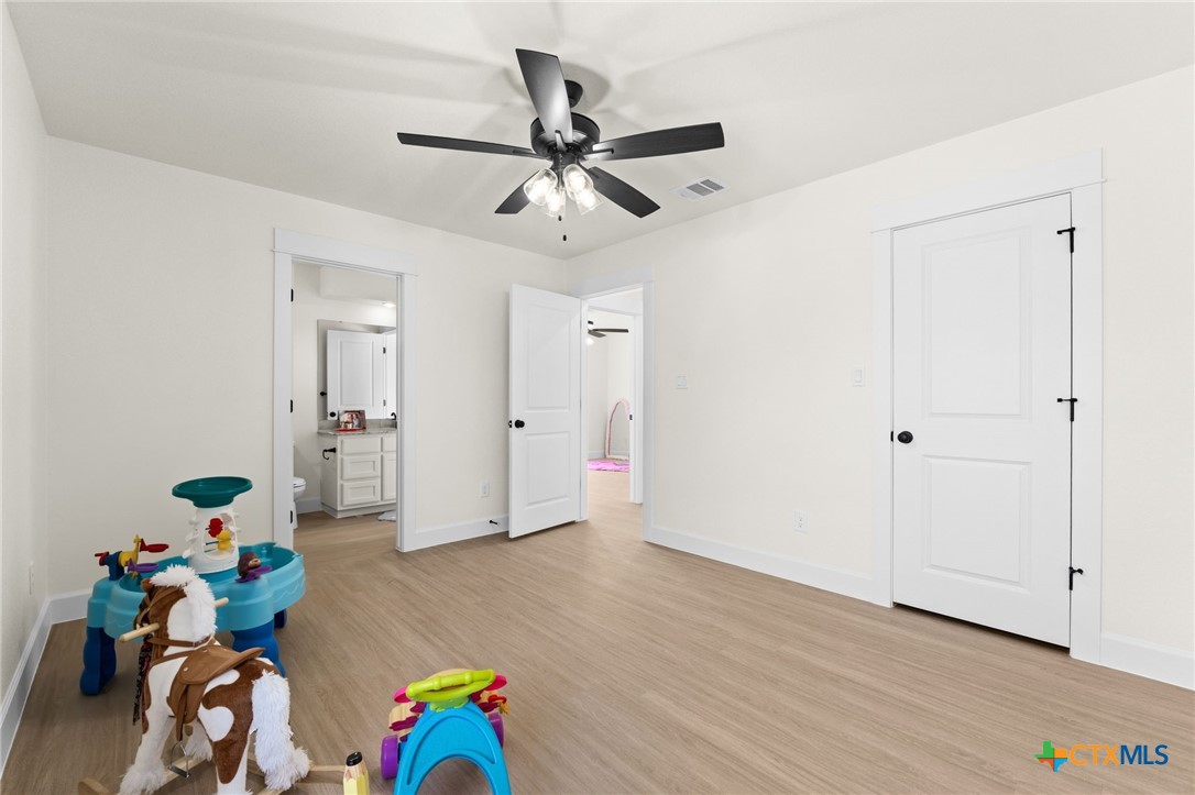 3025 Millhouse Road Copperas Cove, TX 76522 - Photo 26 of 38 a view of an entryway with wooden floor
