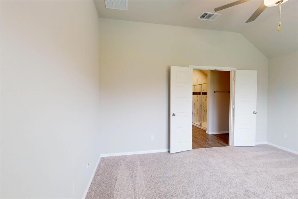 408 Wydown Drive Princeton, TX 75407 - Photo 22 of 40 a view of a room with wooden floor