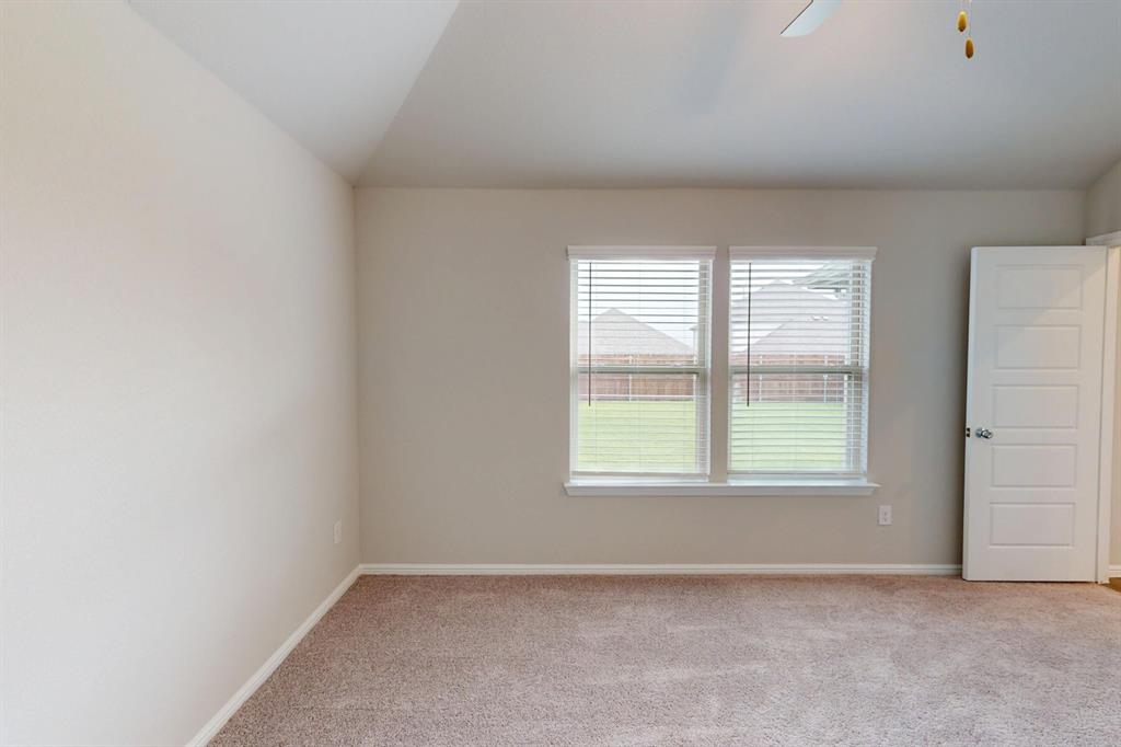 408 Wydown Drive Princeton, TX 75407 - Photo 24 of 40 an empty room with windows