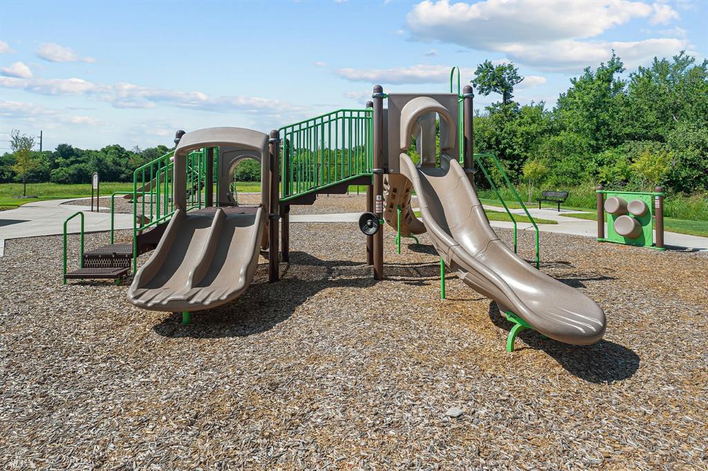 408 Wydown Drive Princeton, TX 75407 - Photo 36 of 40 a park with kid zone