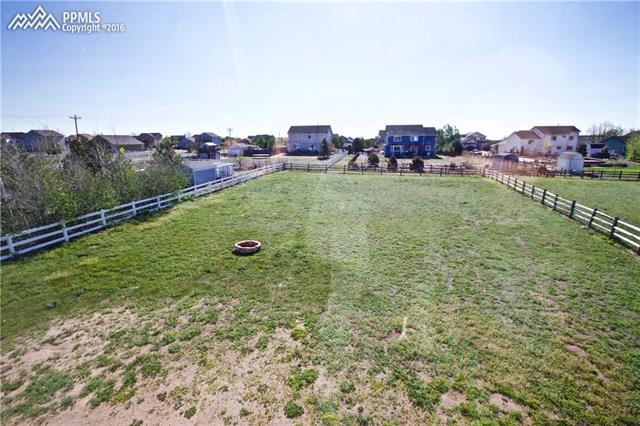 8461 Saddleman Road Peyton, CO 80831 - Photo 26 of 26 Large fenced back yard