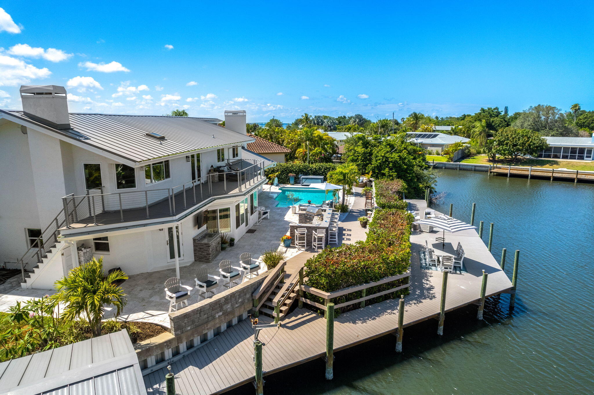452 Sandy Key Melbourne Beach, FL 32951 - Photo 130 of 140 a view of a house with pool and chairs