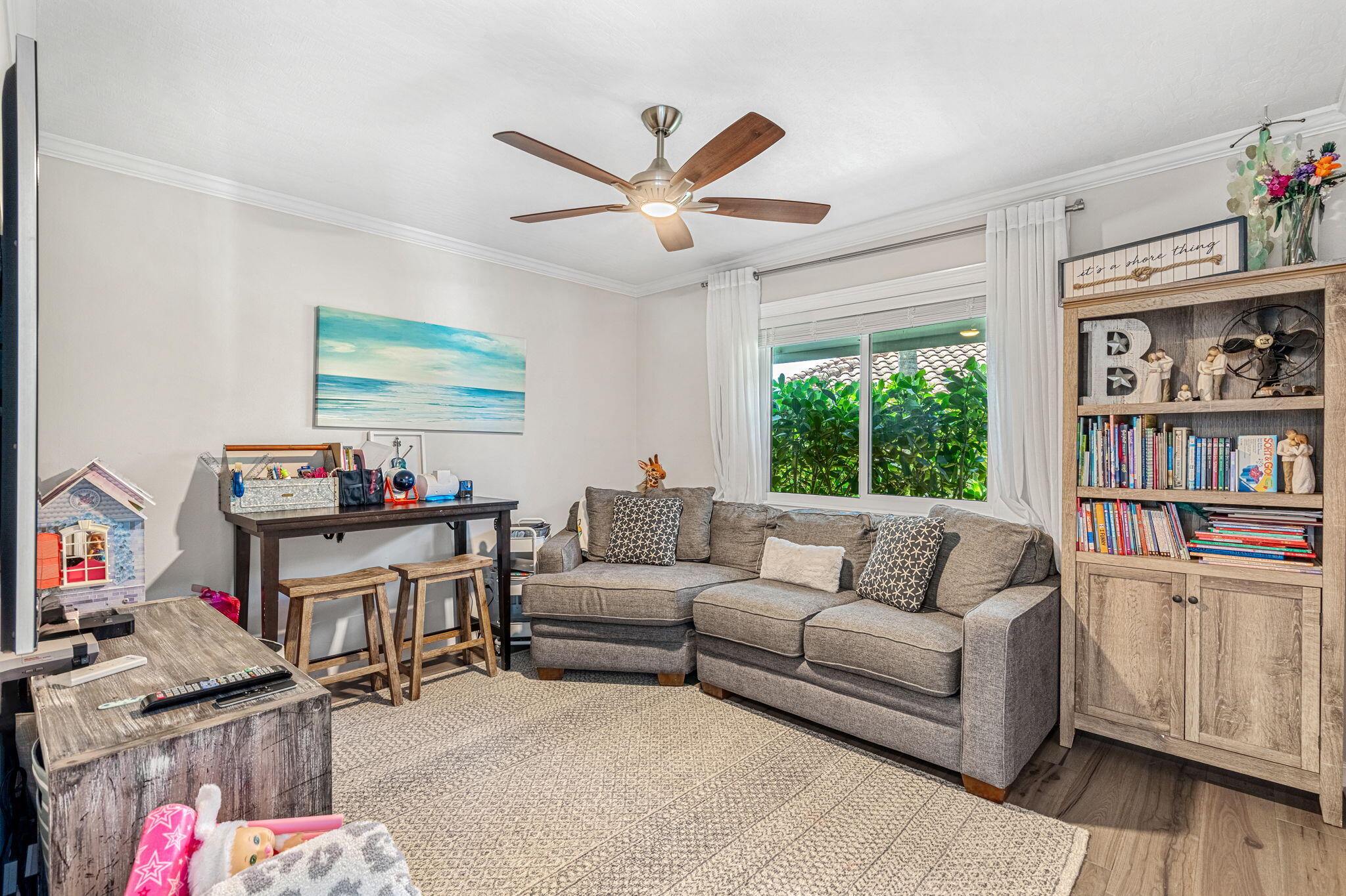 452 Sandy Key Melbourne Beach, FL 32951 - Photo 18 of 140 a living room with furniture and a window