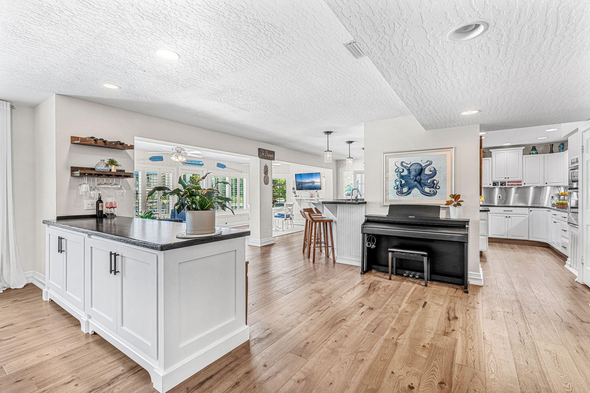 452 Sandy Key Melbourne Beach, FL 32951 - Photo 27 of 140 a living room with furniture and a wooden floor