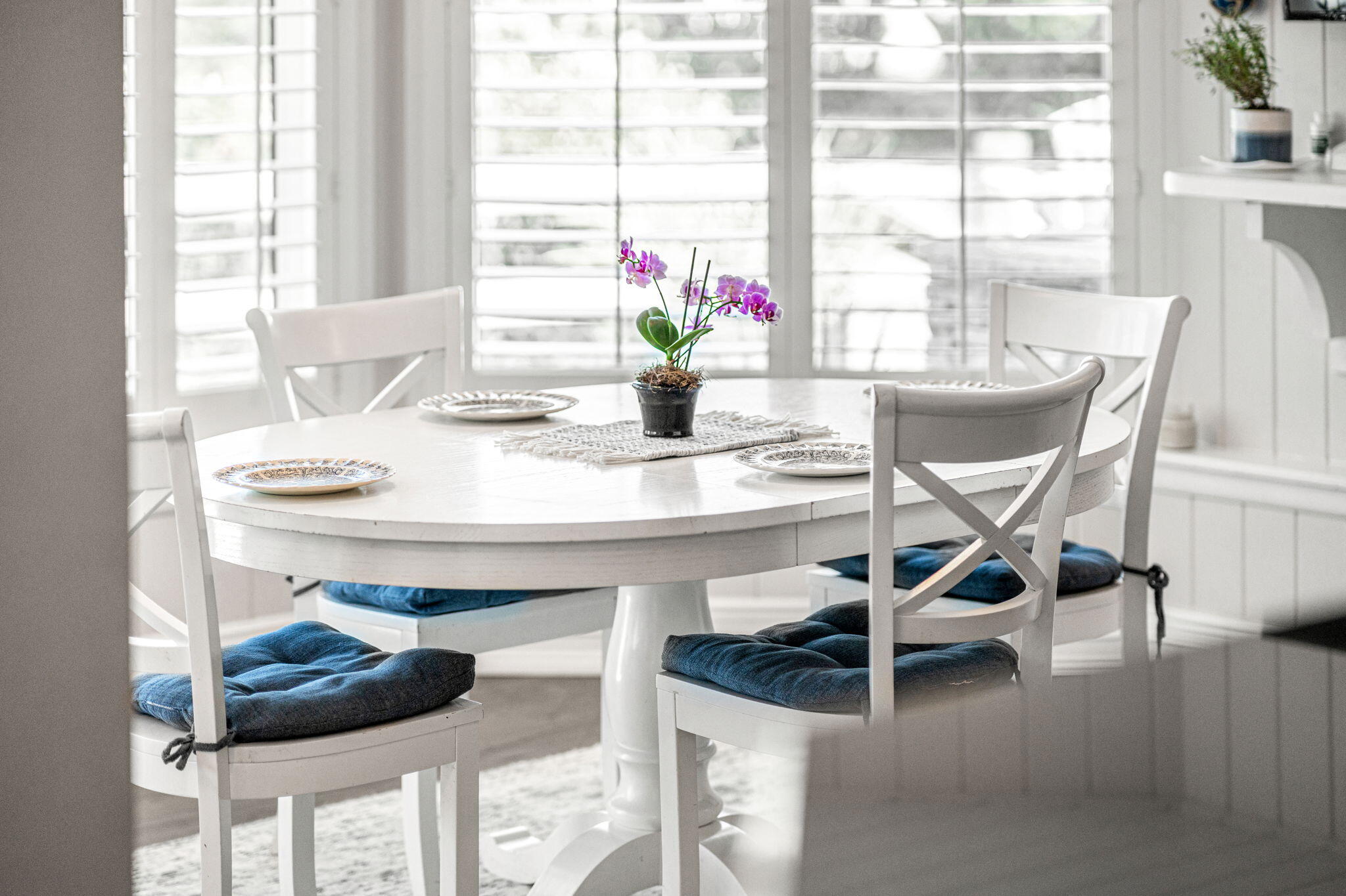 452 Sandy Key Melbourne Beach, FL 32951 - Photo 34 of 140 a view of a dining room with furniture and a potted plant