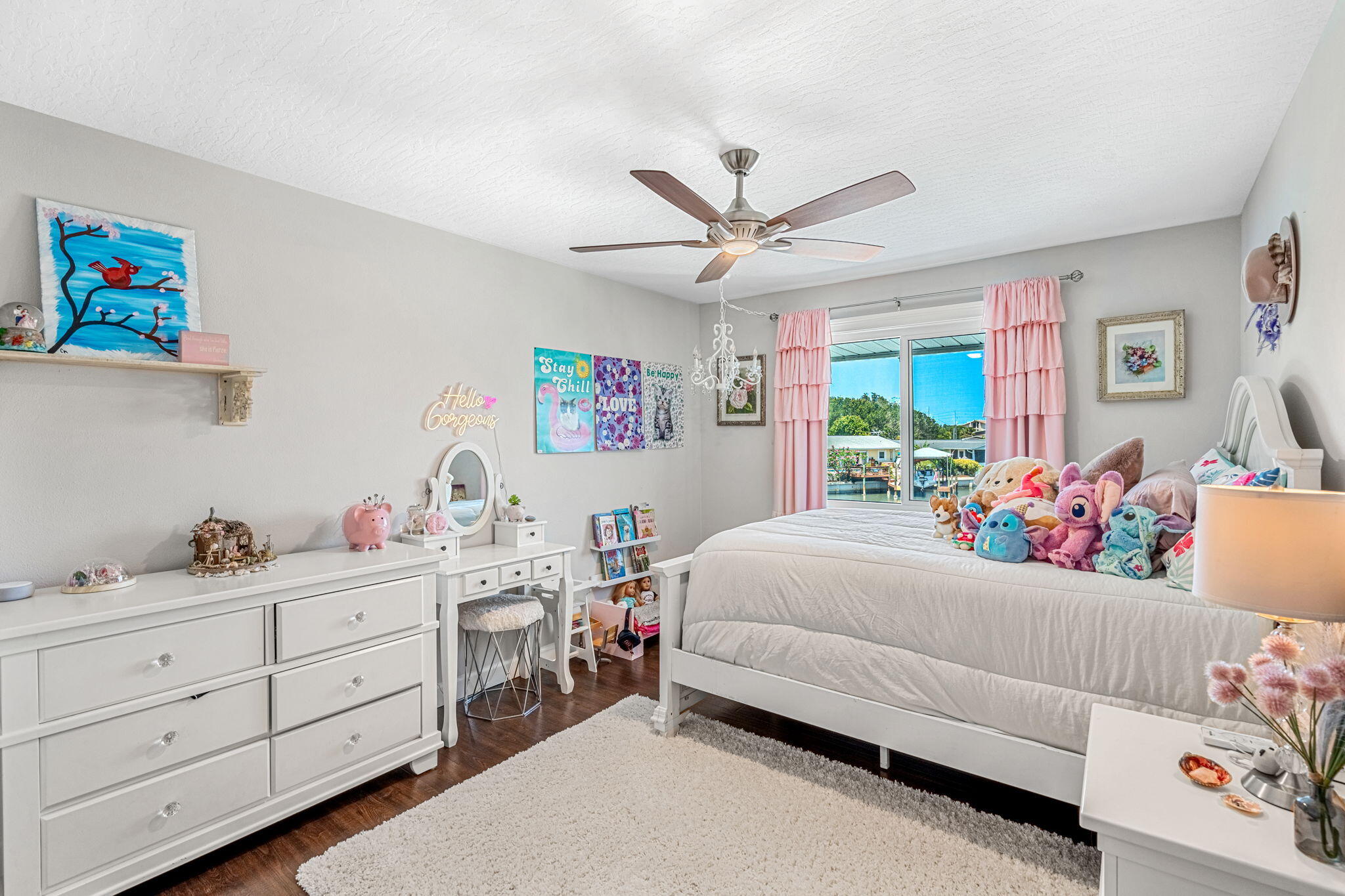 452 Sandy Key Melbourne Beach, FL 32951 - Photo 60 of 140 a bedroom with a bed and a dresser