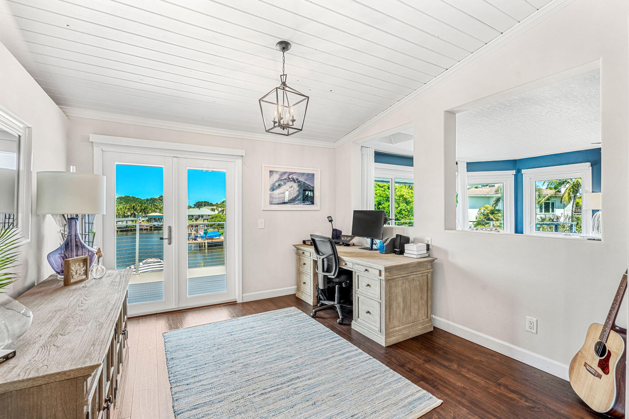 452 Sandy Key Melbourne Beach, FL 32951 - Photo 77 of 140 a view of a kitchen and a sink dishwasher stove with wooden floor