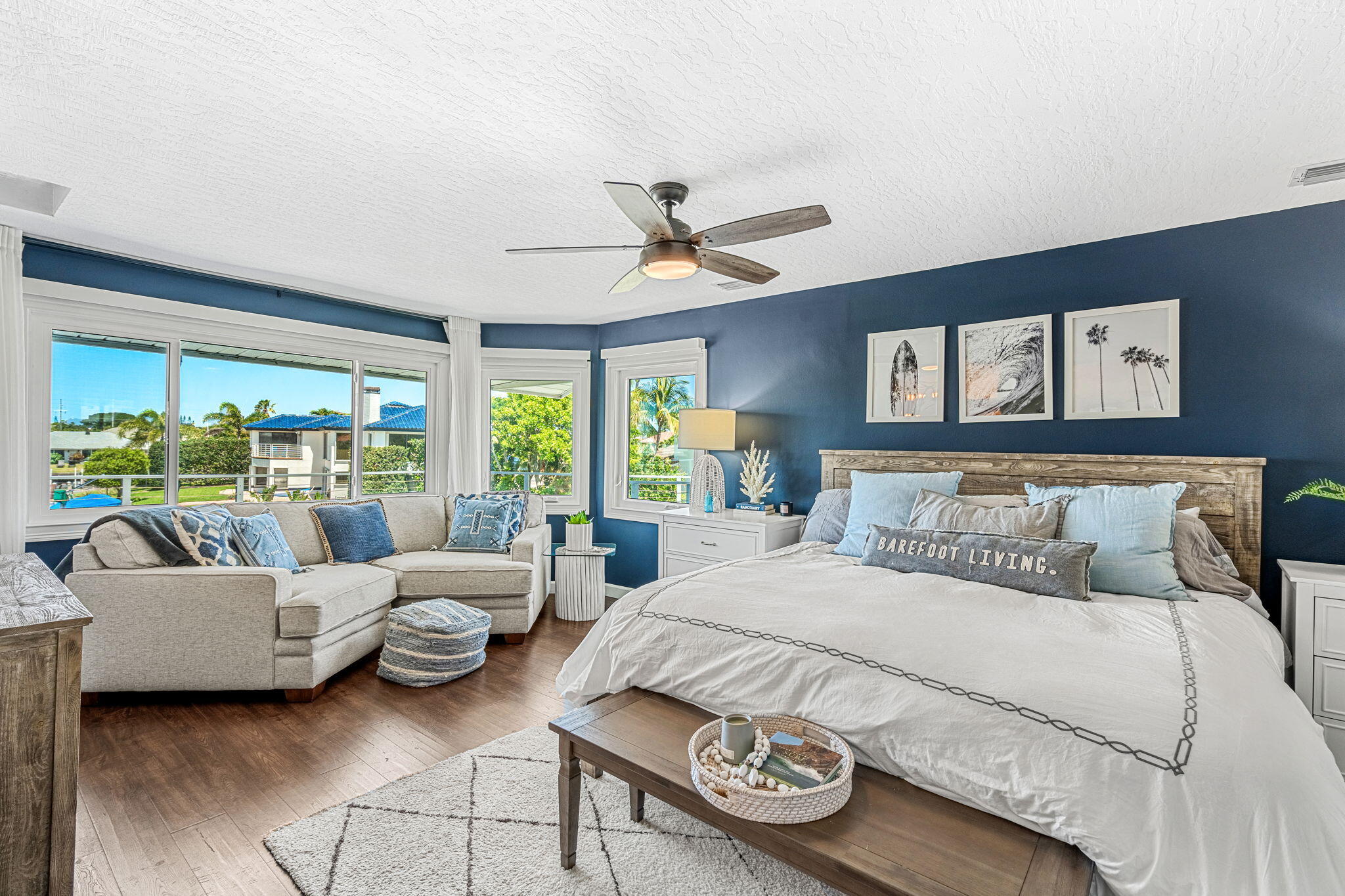 452 Sandy Key Melbourne Beach, FL 32951 - Photo 79 of 140 a bedroom with a bed and a couch