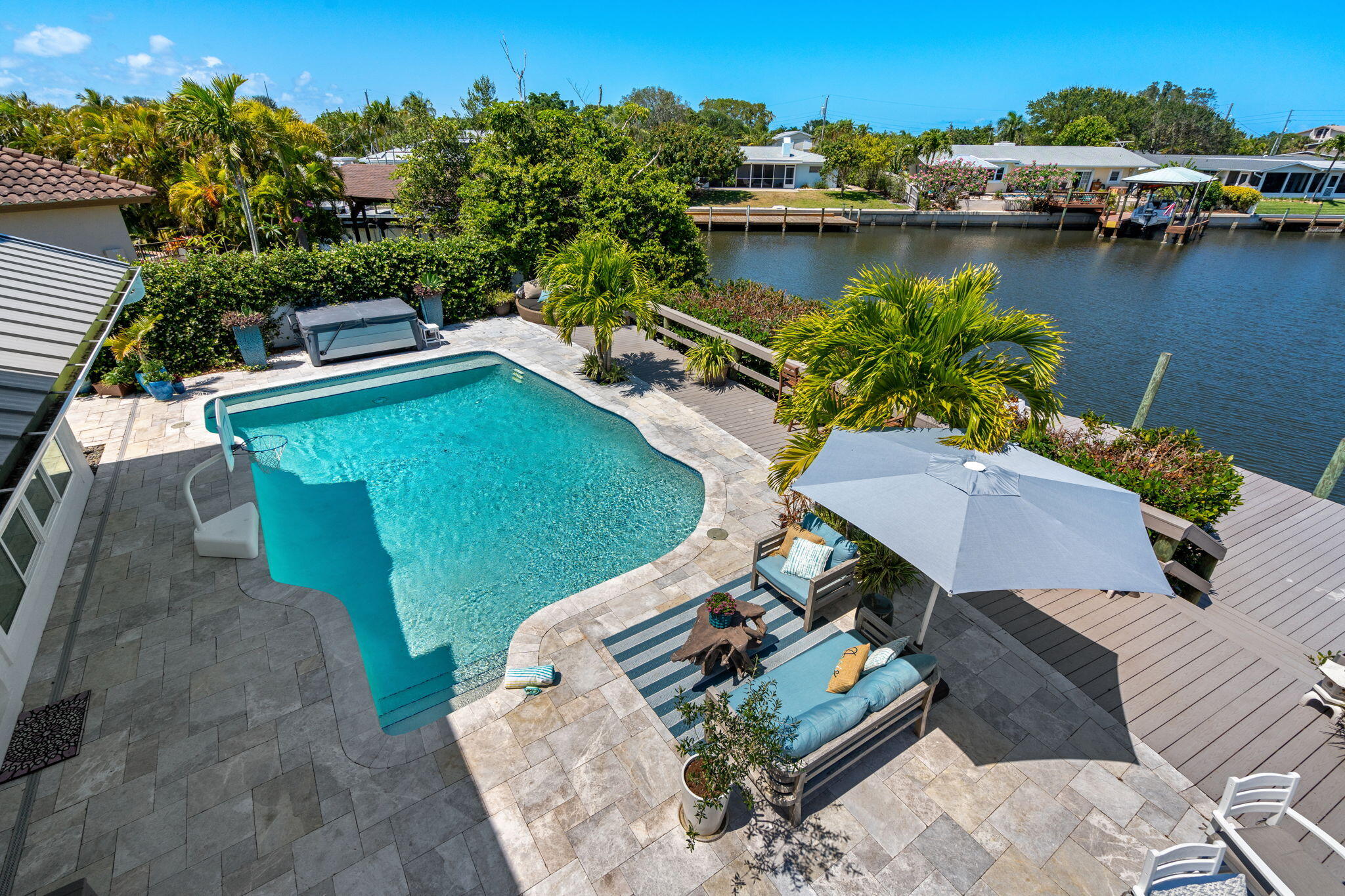 452 Sandy Key Melbourne Beach, FL 32951 - Photo 87 of 140 an aerial view of a house with a garden and lake view