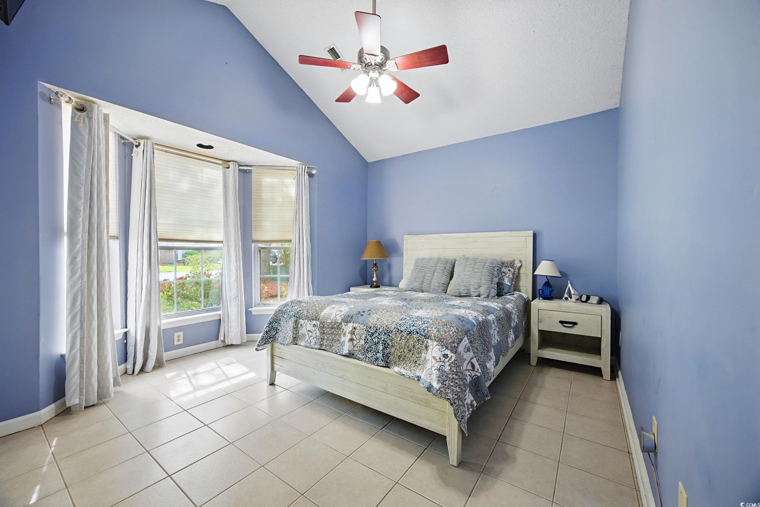 1673 Coventry Road Surfside Beach, SC 29575 - Photo 13 of 30 Bedroom featuring baseboards, lofted ceiling, ceil