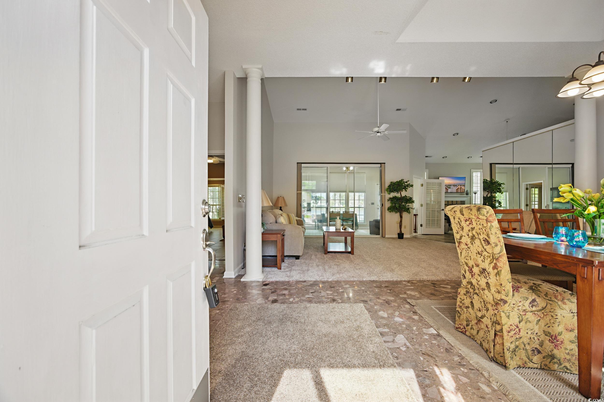 1673 Coventry Road Surfside Beach, SC 29575 - Photo 2 of 30 Entrance foyer with ornate columns, a high ceiling