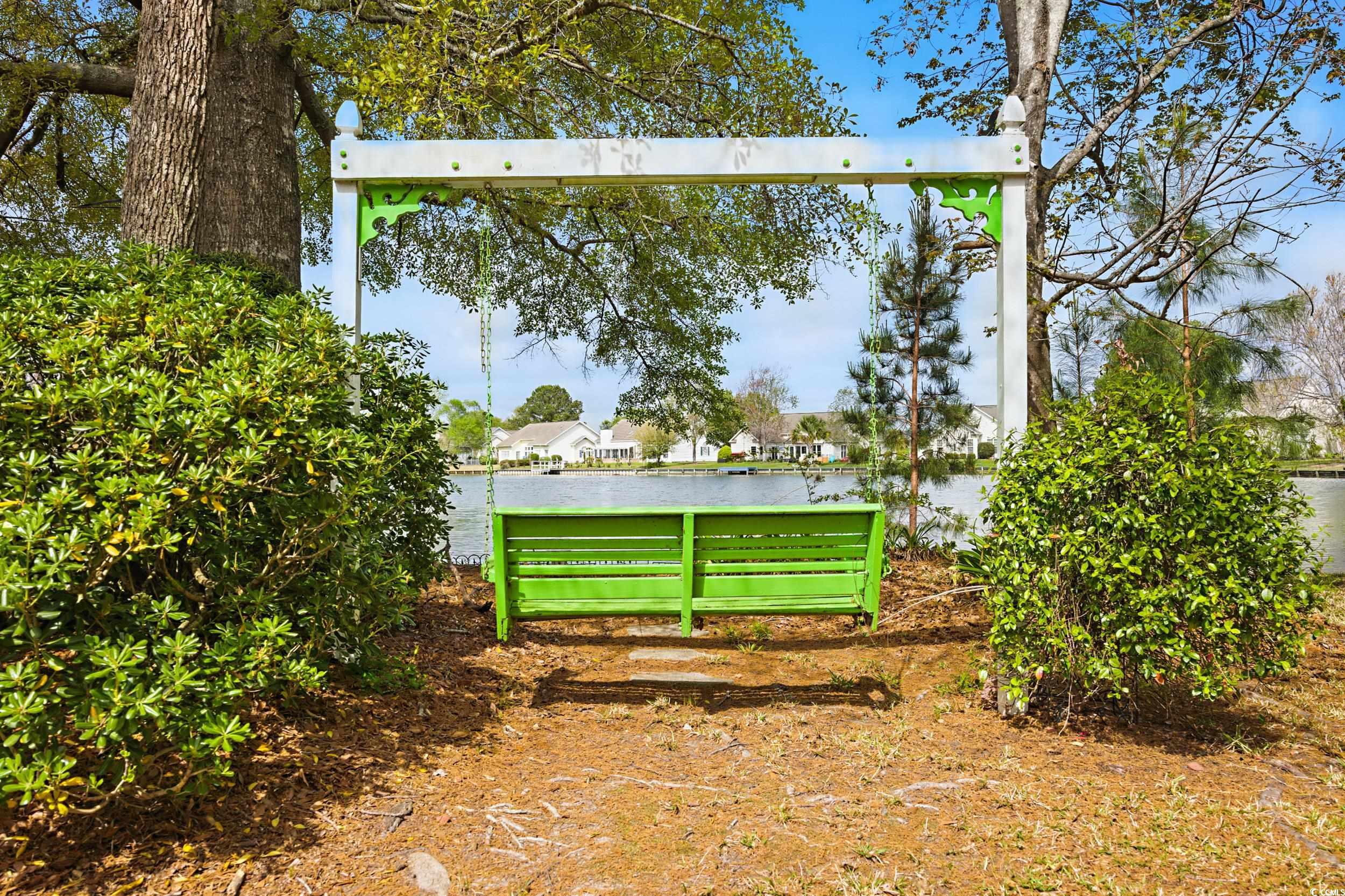 1673 Coventry Road Surfside Beach, SC 29575 - Photo 25 of 30 View of yard with a fire pit and a water view