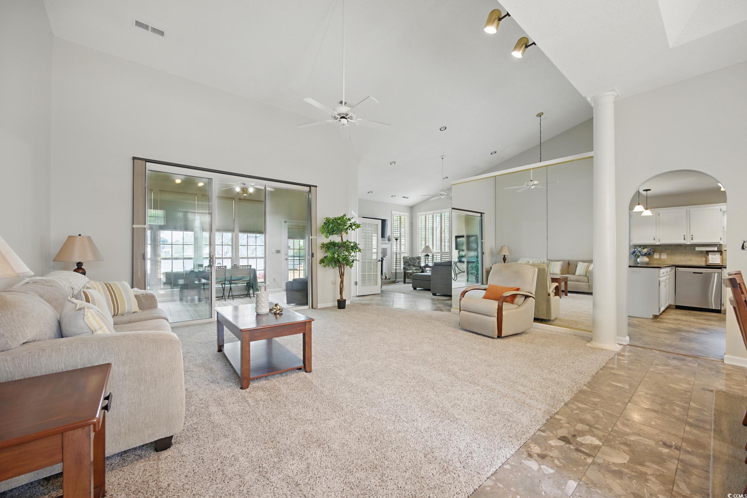 1673 Coventry Road Surfside Beach, SC 29575 - Photo 7 of 30 Living room featuring visible vents, high vaulted
