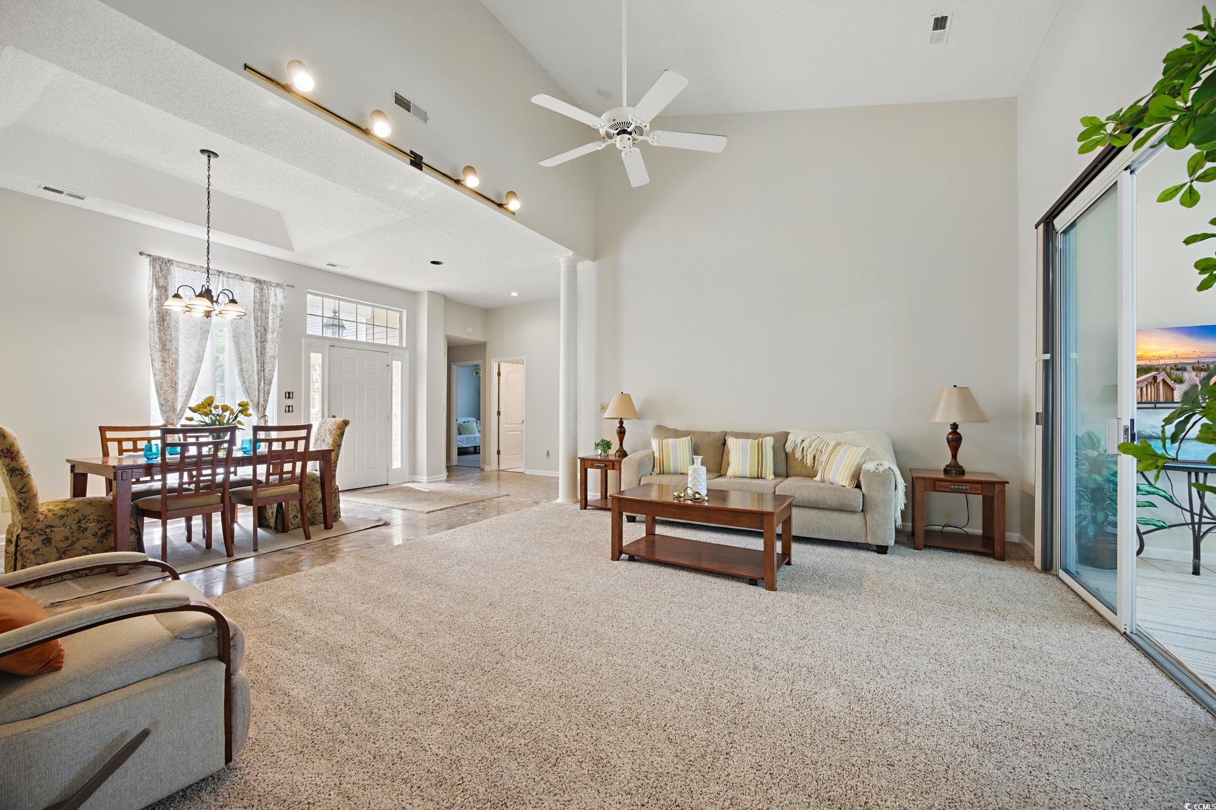 1673 Coventry Road Surfside Beach, SC 29575 - Photo 9 of 30 Living area with carpet flooring, ceiling fan with