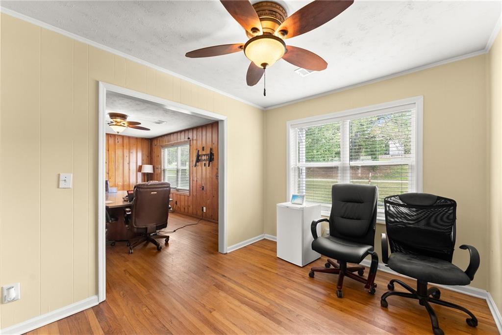 6455 Main Street Lula, GA 30554 - Photo 15 of 43 a living room with furniture and a window