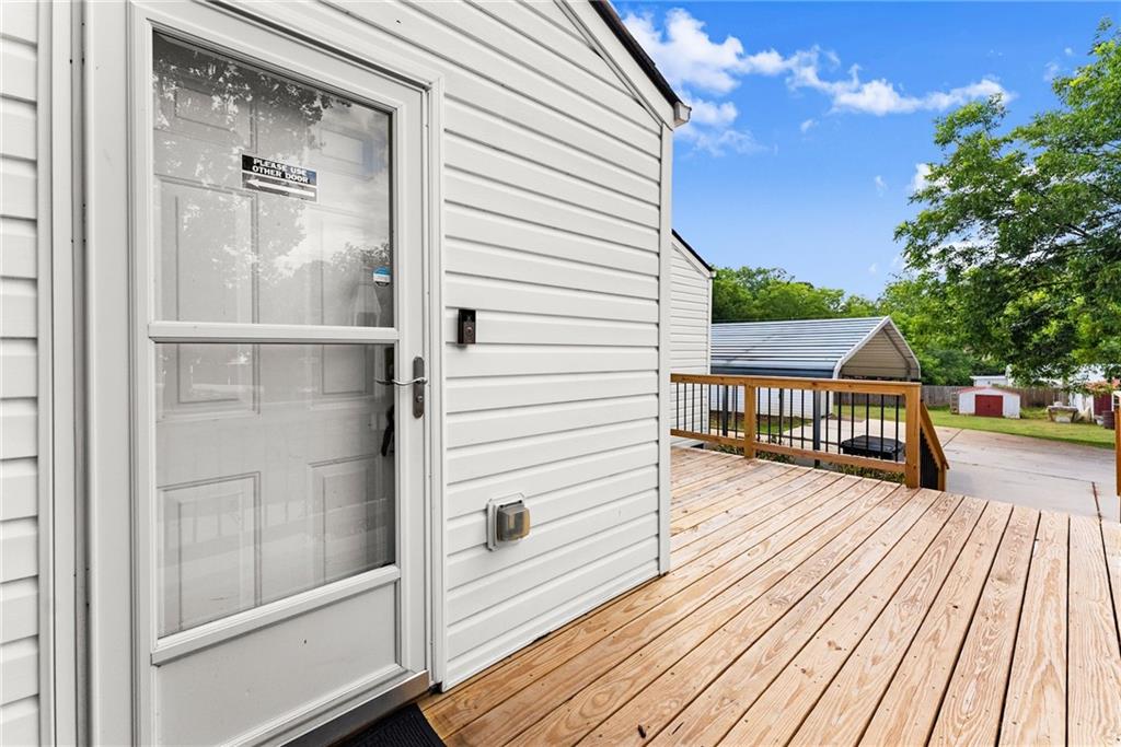 6455 Main Street Lula, GA 30554 - Photo 28 of 43 a view of a balcony with wooden floor