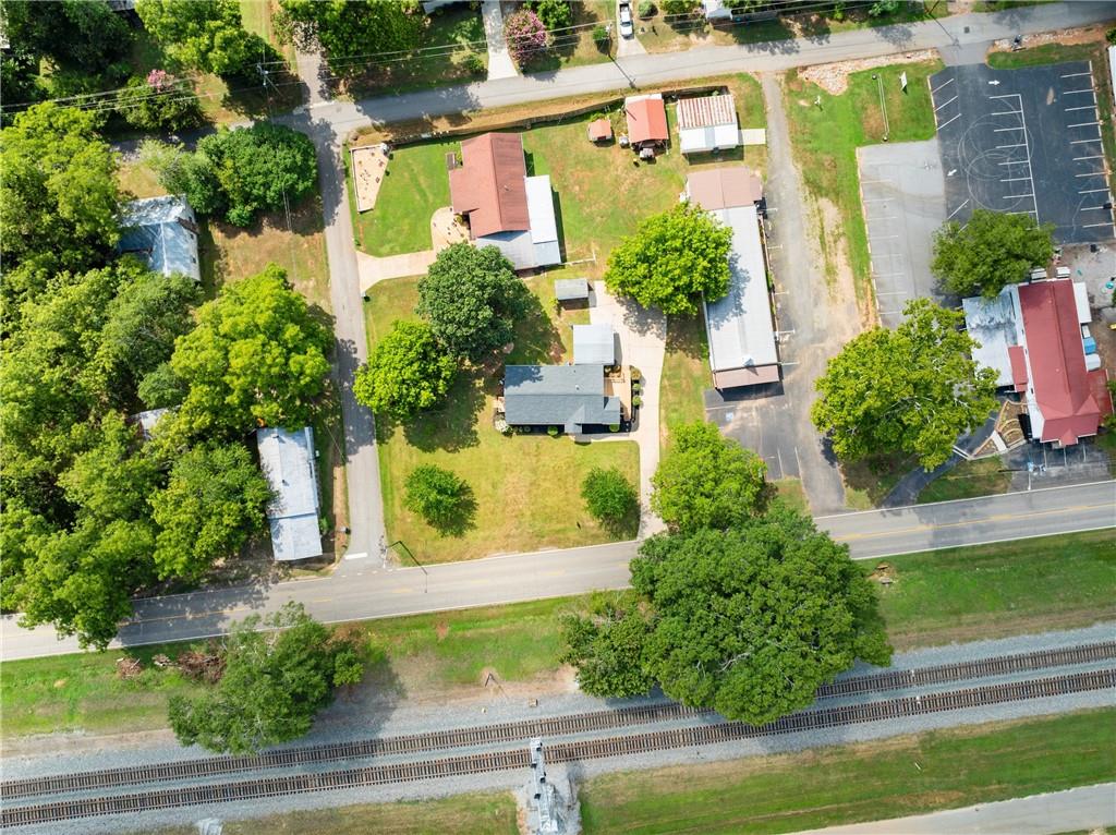 6455 Main Street Lula, GA 30554 - Photo 35 of 43 an aerial view of a house with a yard and potted plants