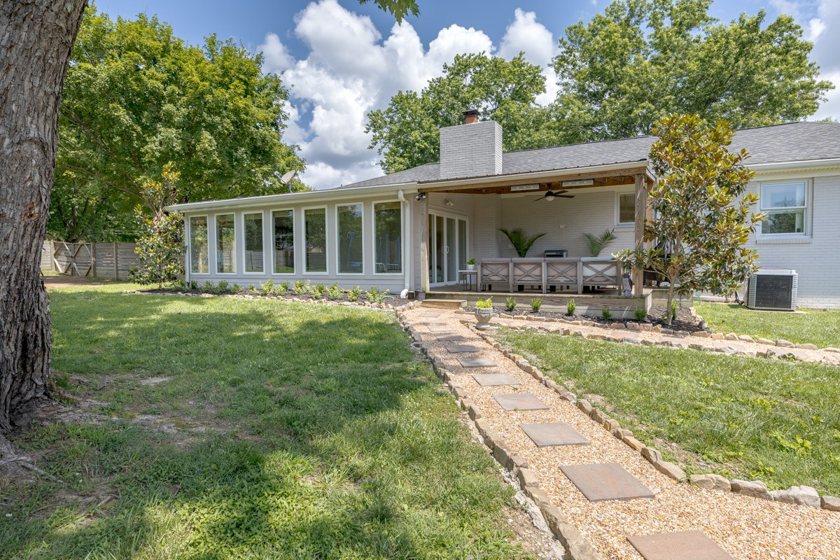 109 Poplar Street Franklin, TN 37064 - Photo 46 of 72 a front view of house with yard and green space