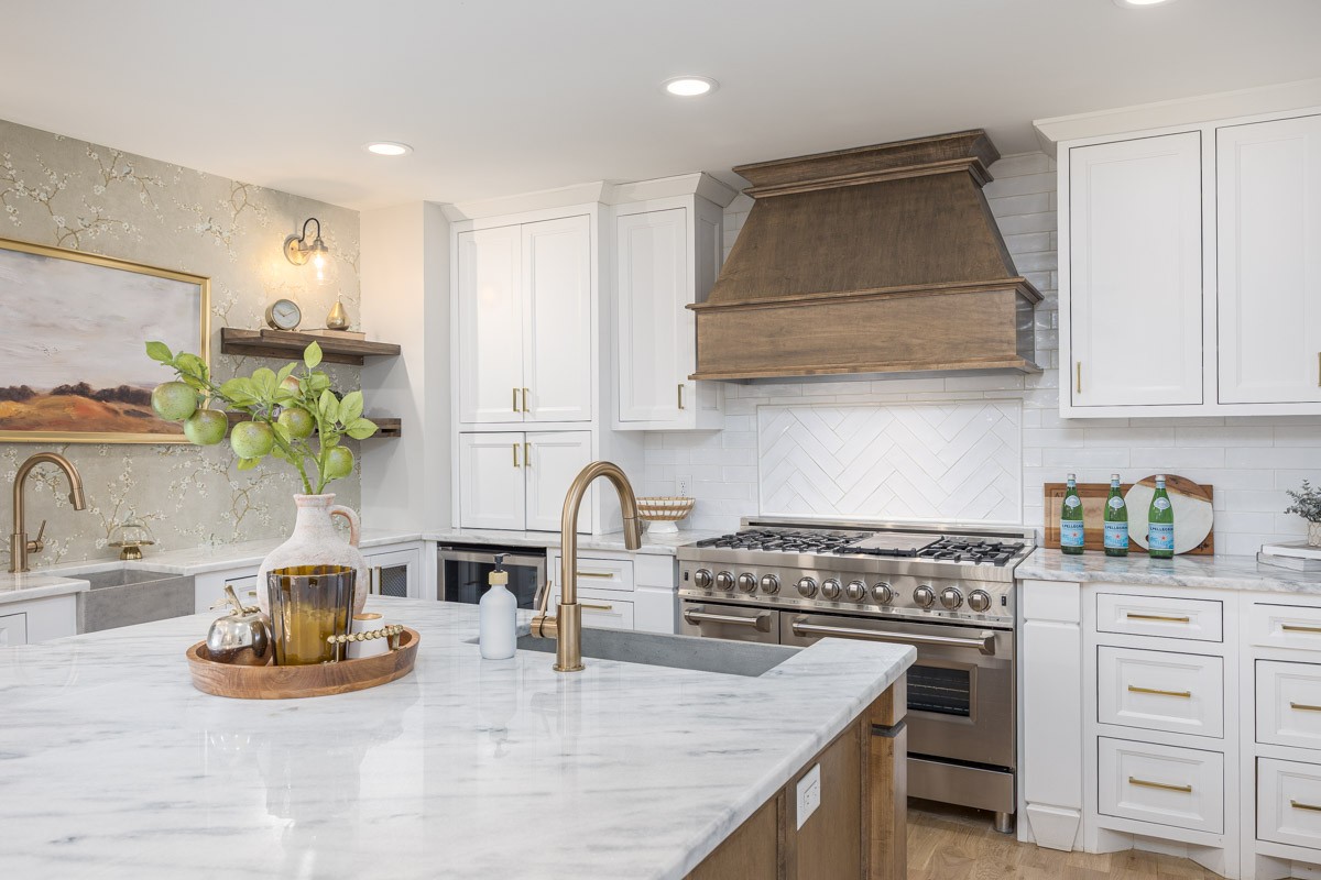 109 Poplar Street Franklin, TN 37064 - Photo 8 of 72 a kitchen with stainless steel appliances granite countertop a stove a sink and a white cabinets