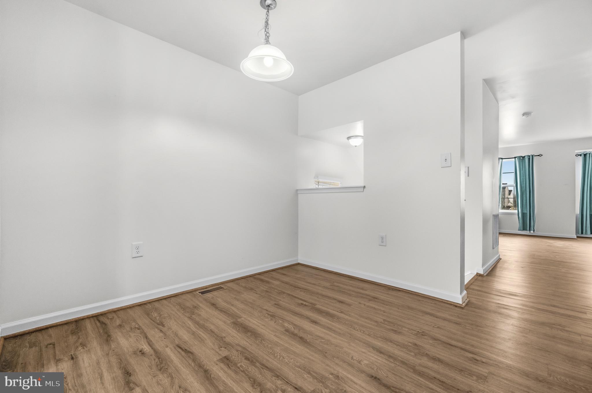 31 Wayside Court Falling Waters, WV 25419 - Photo 13 of 36 a view of a room with wooden floor and a window