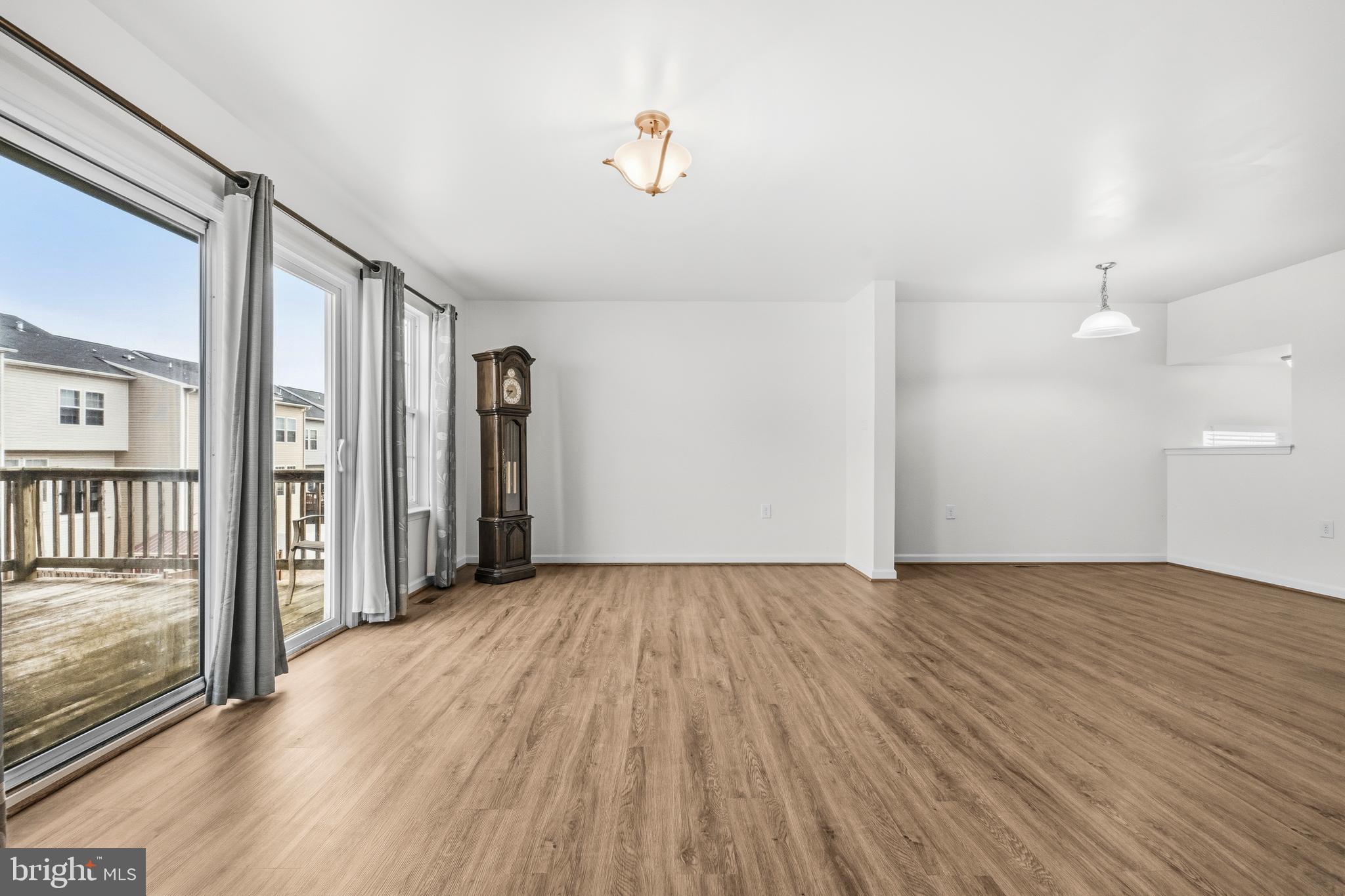 31 Wayside Court Falling Waters, WV 25419 - Photo 16 of 36 wooden floor in an empty room with a window