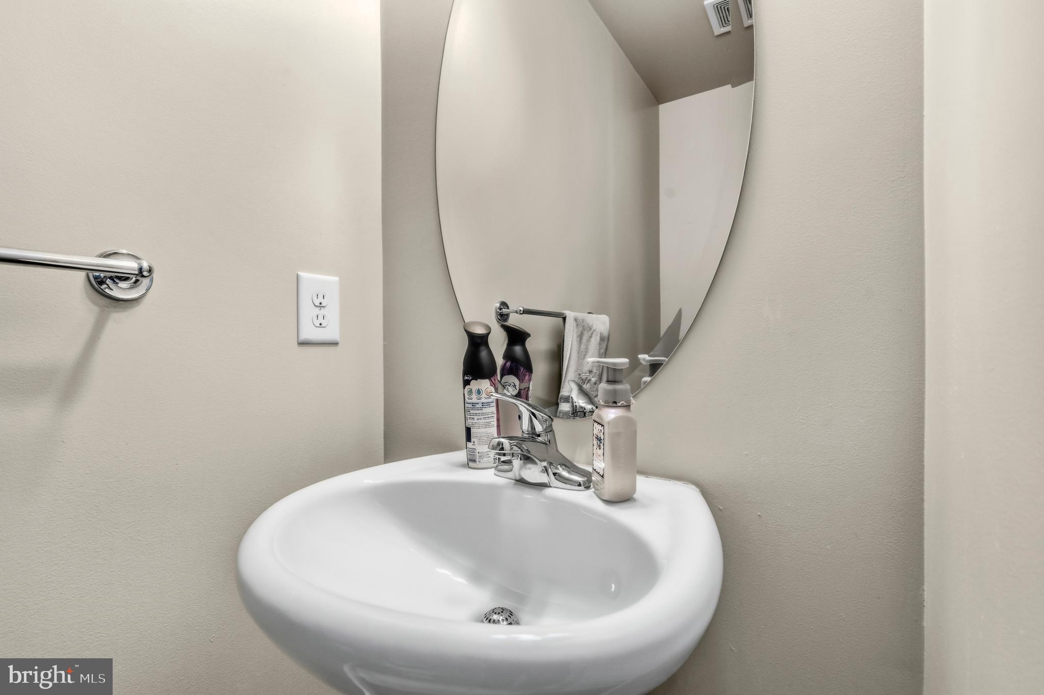 31 Wayside Court Falling Waters, WV 25419 - Photo 17 of 36 a bathroom with a sink and a mirror