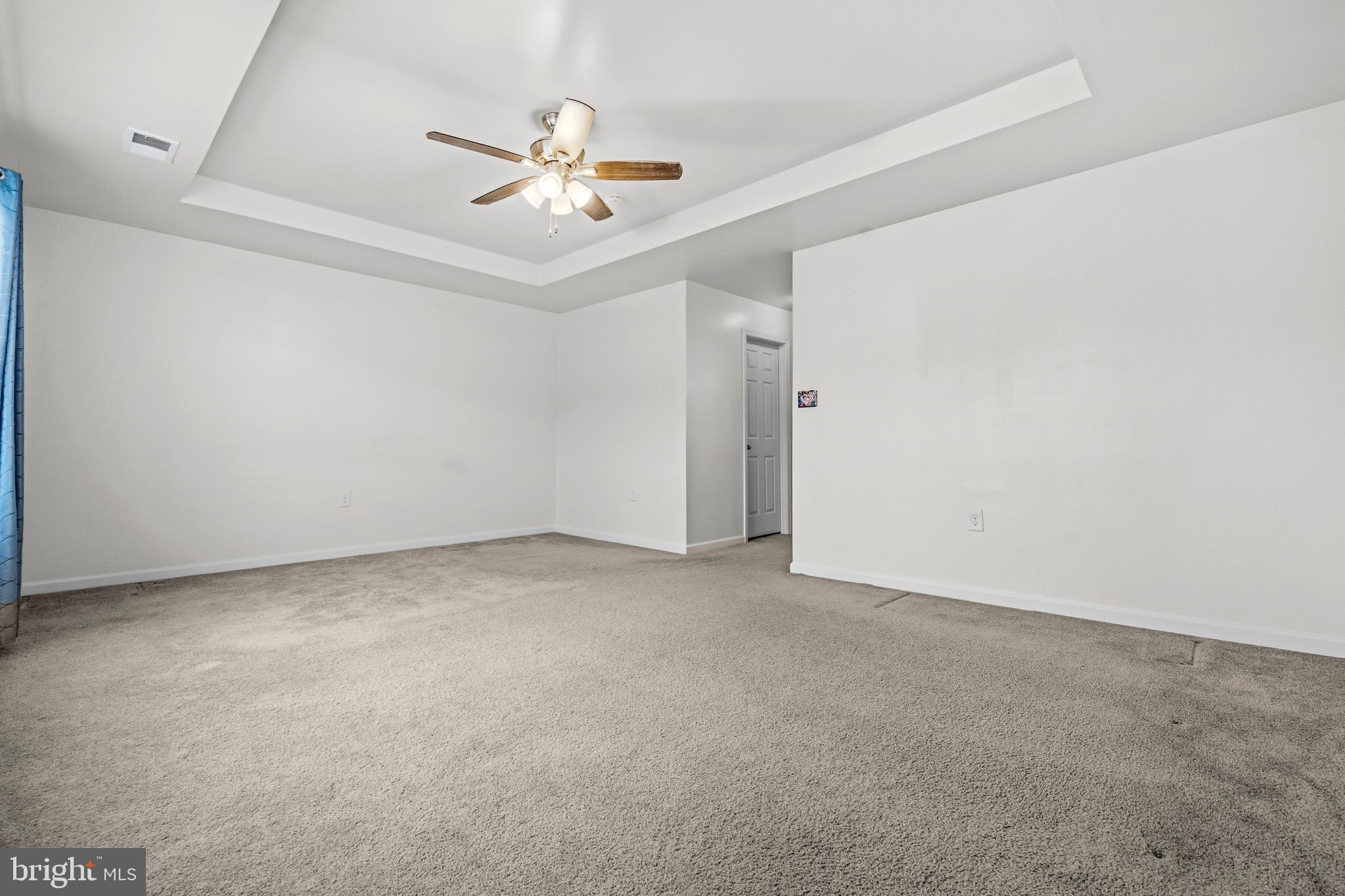 31 Wayside Court Falling Waters, WV 25419 - Photo 20 of 36 an empty room with windows and fan
