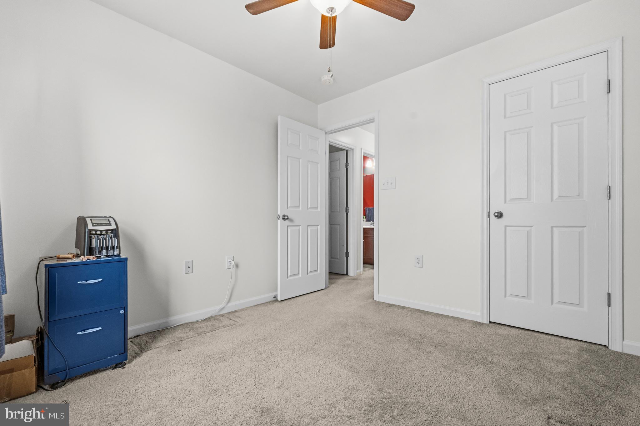 31 Wayside Court Falling Waters, WV 25419 - Photo 26 of 36 a view of an empty room with cabinet and dresser