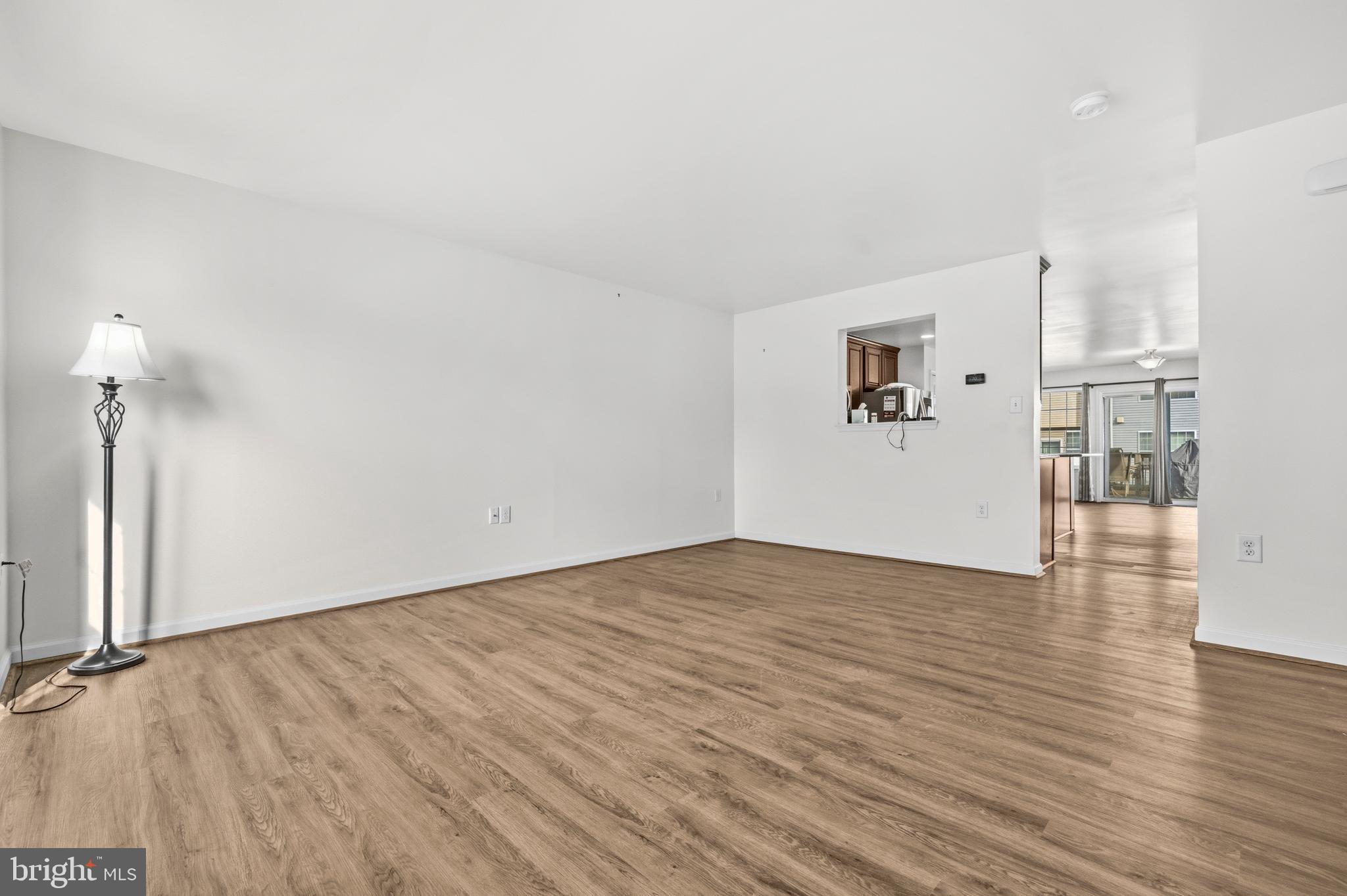 31 Wayside Court Falling Waters, WV 25419 - Photo 7 of 36 a view of empty room with wooden floor