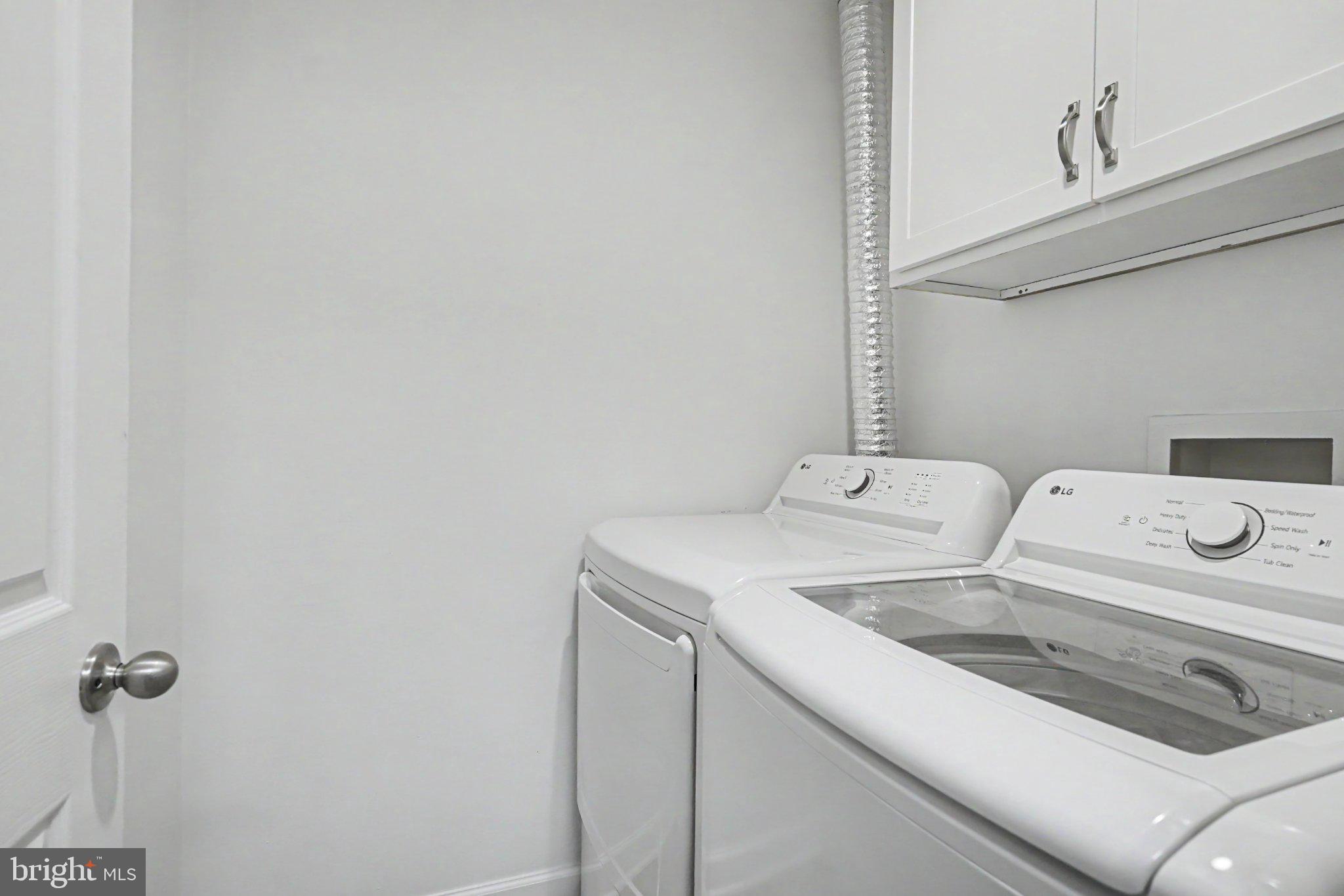 14800 Rydell Road, Unit 201 Centreville, VA 20121 - Photo 11 of 28 Bright and functional laundry space.