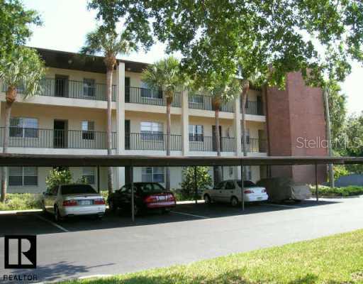 2444 Enterprise Road, Unit 239 Clearwater, FL 33763 - Photo 1 of 1 a front view of a building with street view