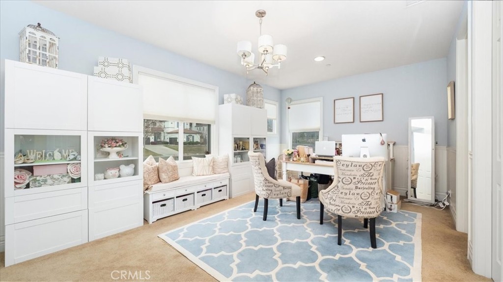 9655 Norbrook Drive Rancho Cucamonga, CA 91737 - Photo 32 of 68 a living room with furniture and a chandelier