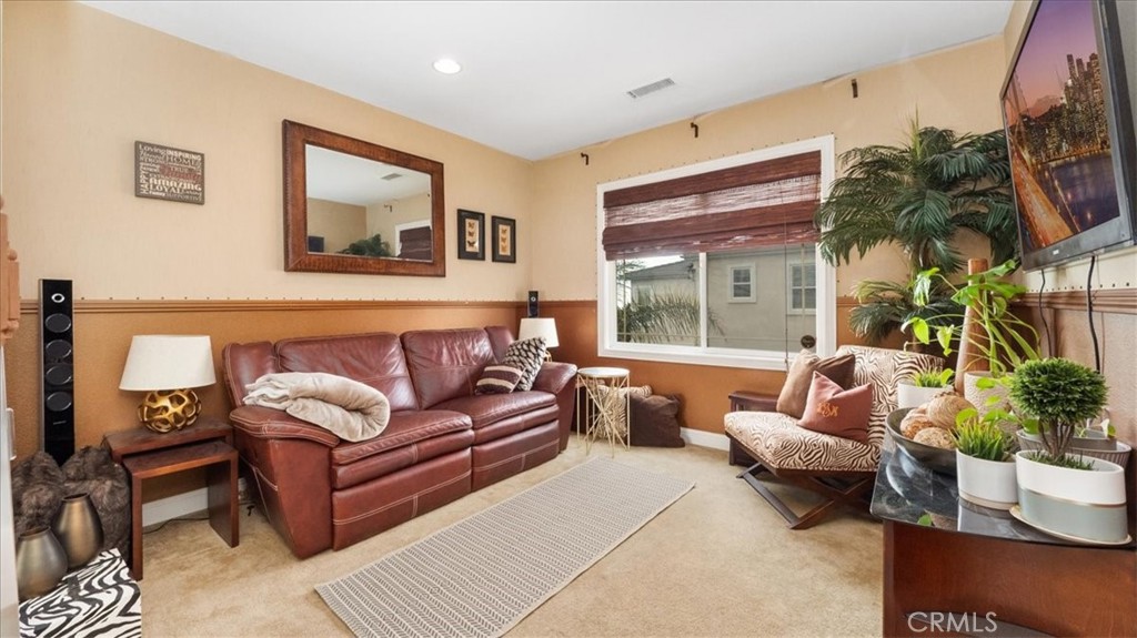 9655 Norbrook Drive Rancho Cucamonga, CA 91737 - Photo 33 of 68 a living room with furniture and a large window
