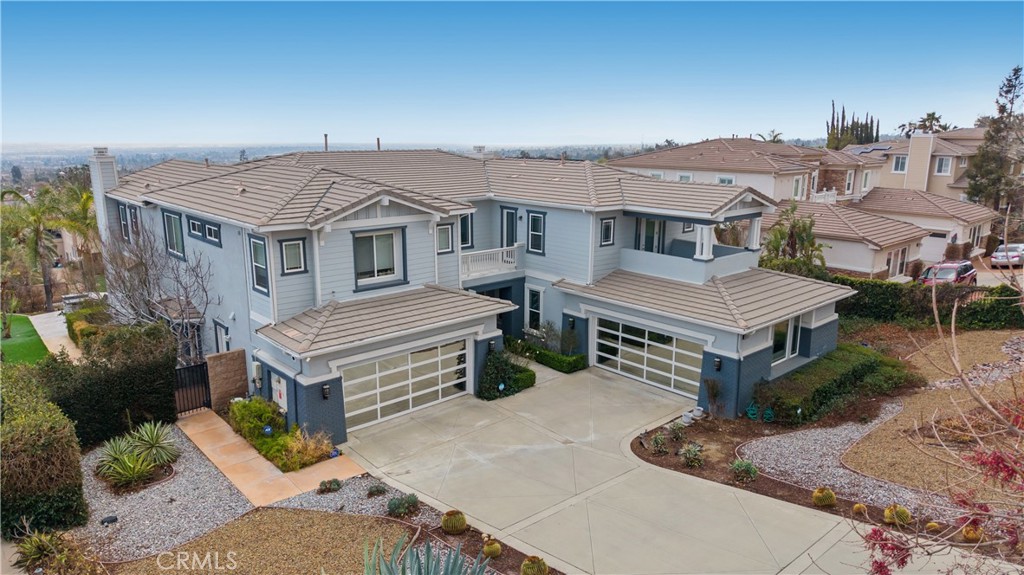 9655 Norbrook Drive Rancho Cucamonga, CA 91737 - Photo 4 of 68 an aerial view of a house with a garden and deck