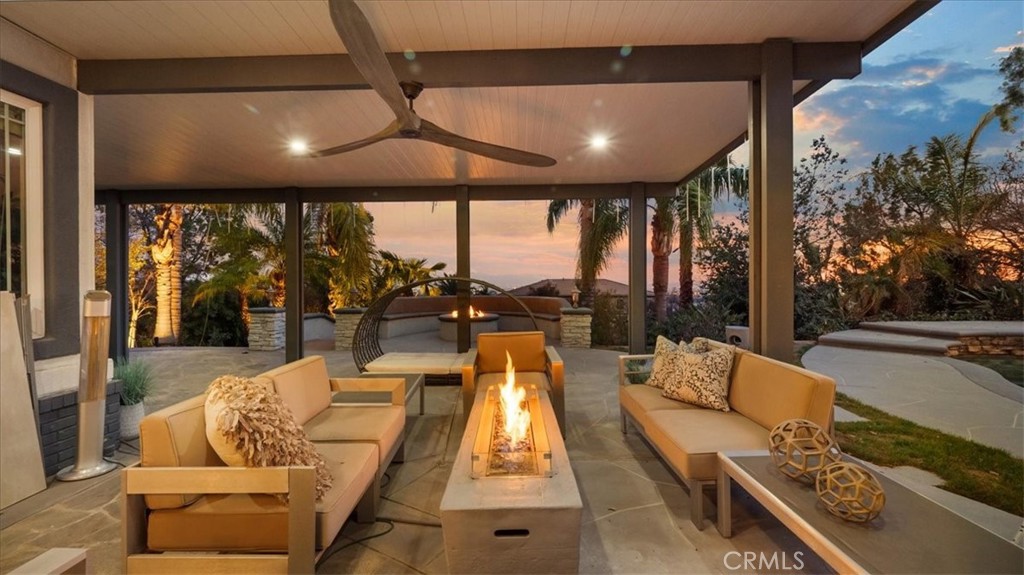 9655 Norbrook Drive Rancho Cucamonga, CA 91737 - Photo 57 of 68 a living room with furniture and a large window