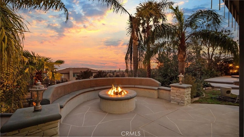 9655 Norbrook Drive Rancho Cucamonga, CA 91737 - Photo 59 of 68 a view of a patio with couches and a fire pit