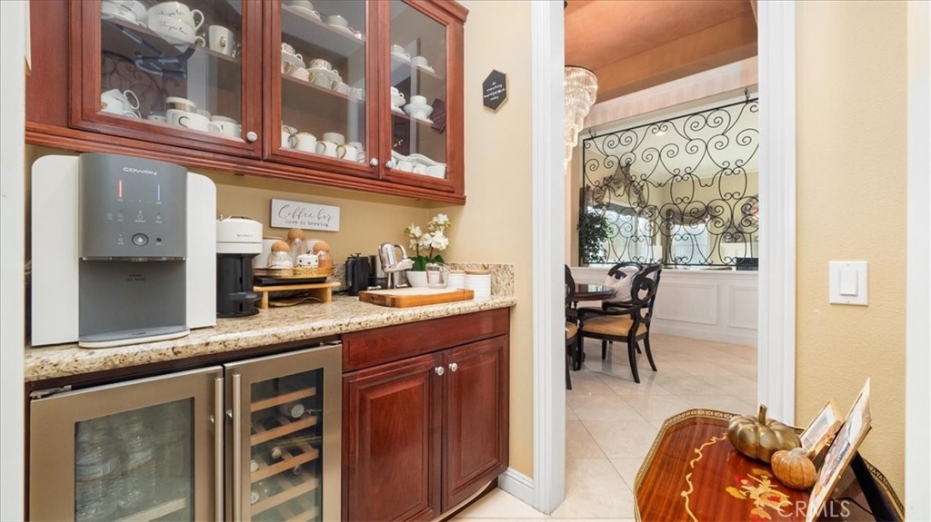 9655 Norbrook Drive Rancho Cucamonga, CA 91737 - Photo 9 of 68 a kitchen with stainless steel appliances granite countertop a sink and cabinets