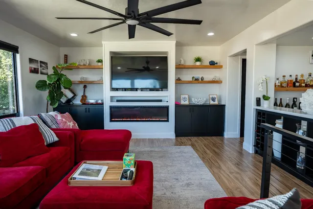 a kitchen with stainless steel appliances a stove and a microwave