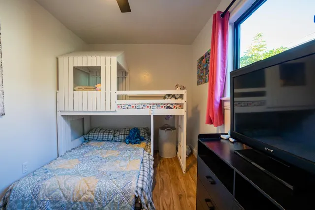 a front view of a house with parking area