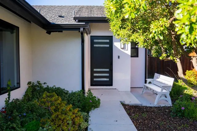 a view of entryway with wooden floor