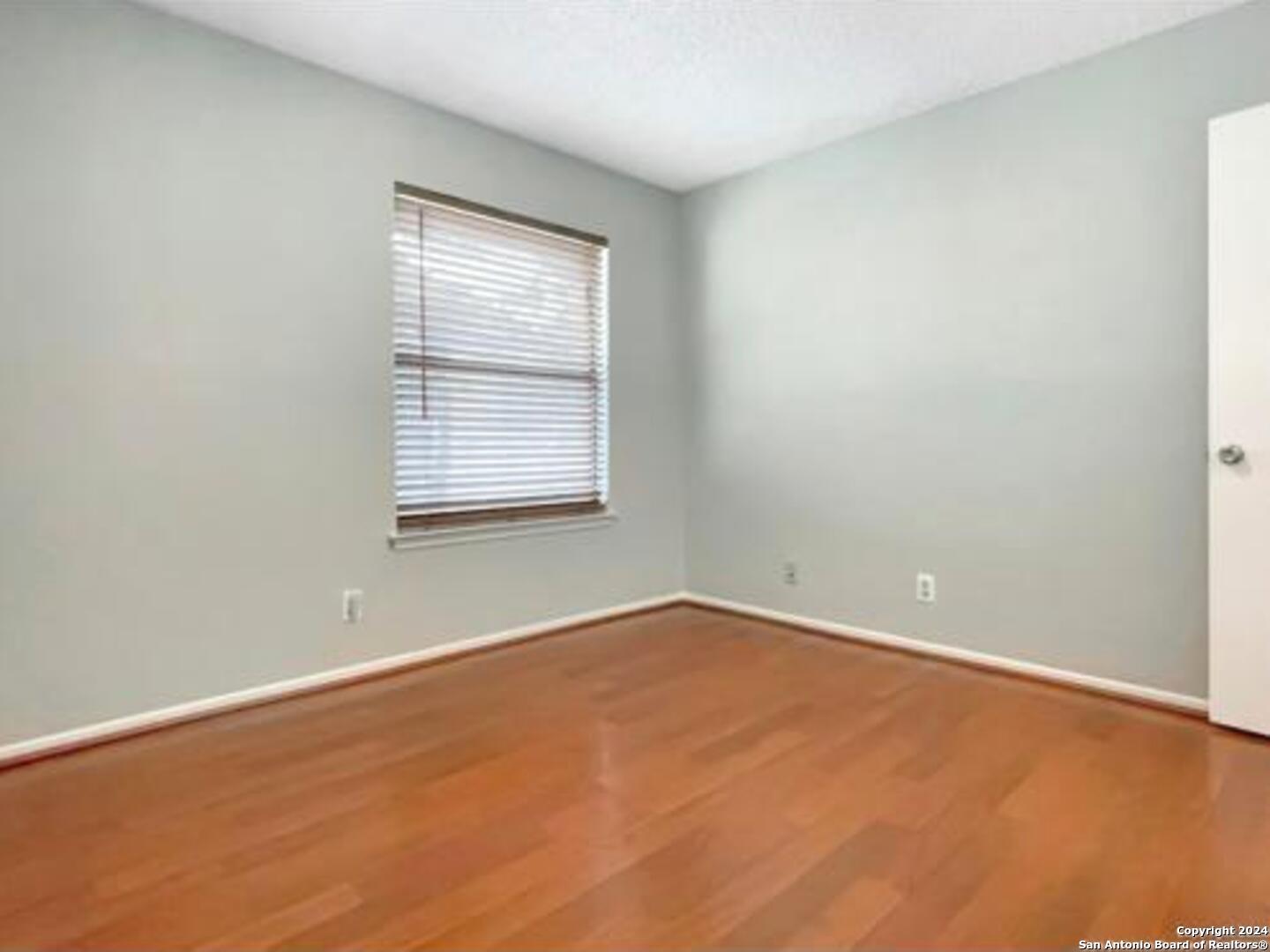 11520 Huebner Road, Unit 107 San Antonio, TX 78230 - Photo 15 of 22 an empty room with a window