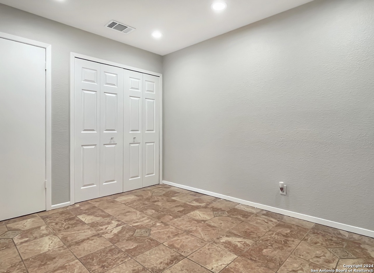 11520 Huebner Road, Unit 107 San Antonio, TX 78230 - Photo 18 of 22 a view of an empty room