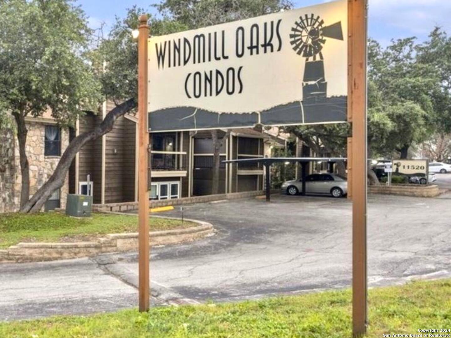 11520 Huebner Road, Unit 107 San Antonio, TX 78230 - Photo 22 of 22 a front view of a house with a garden