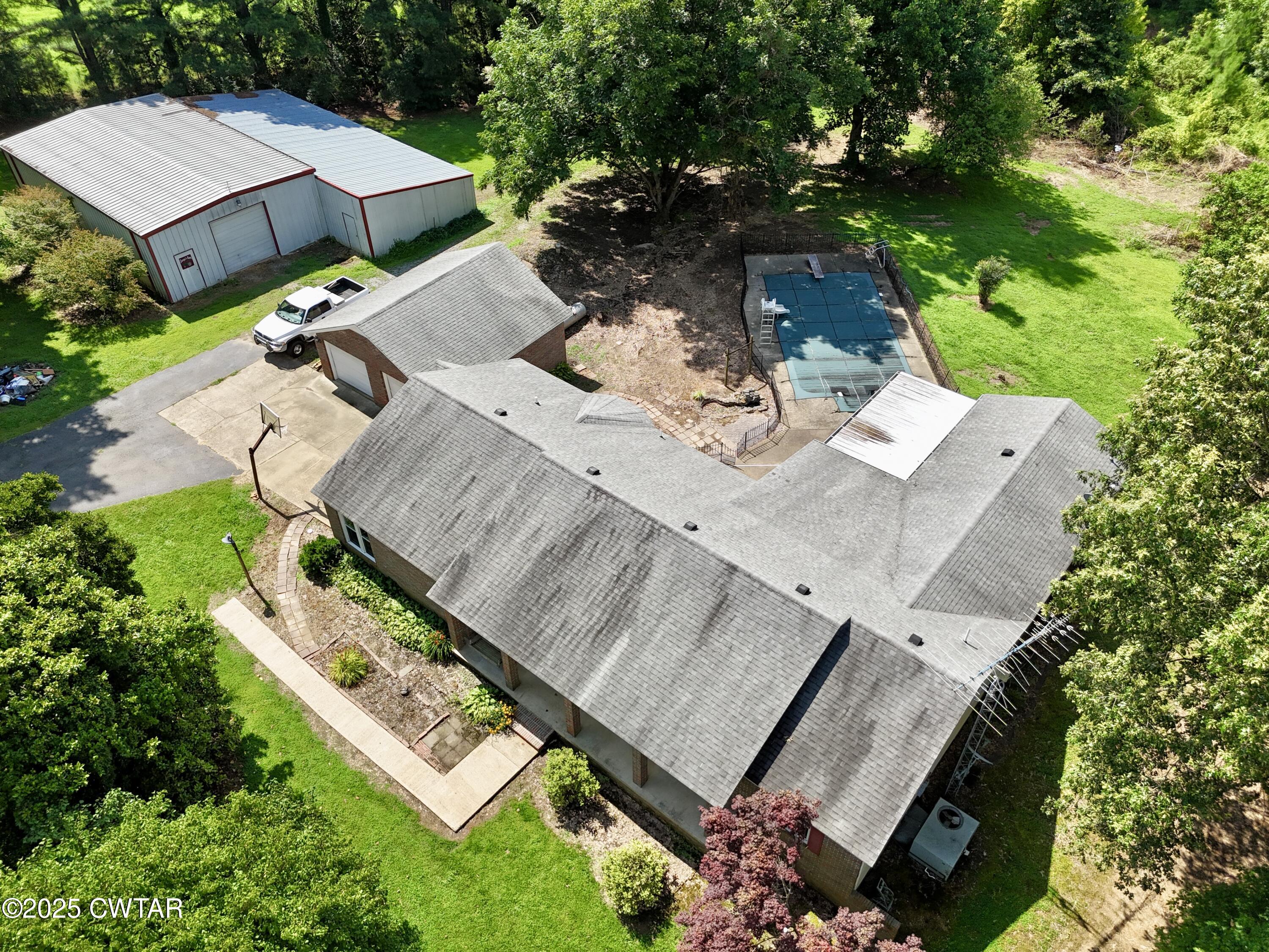 1921 Forrester Road Newbern, TN 38059 - Photo 16 of 18 an aerial view of a house with a yard