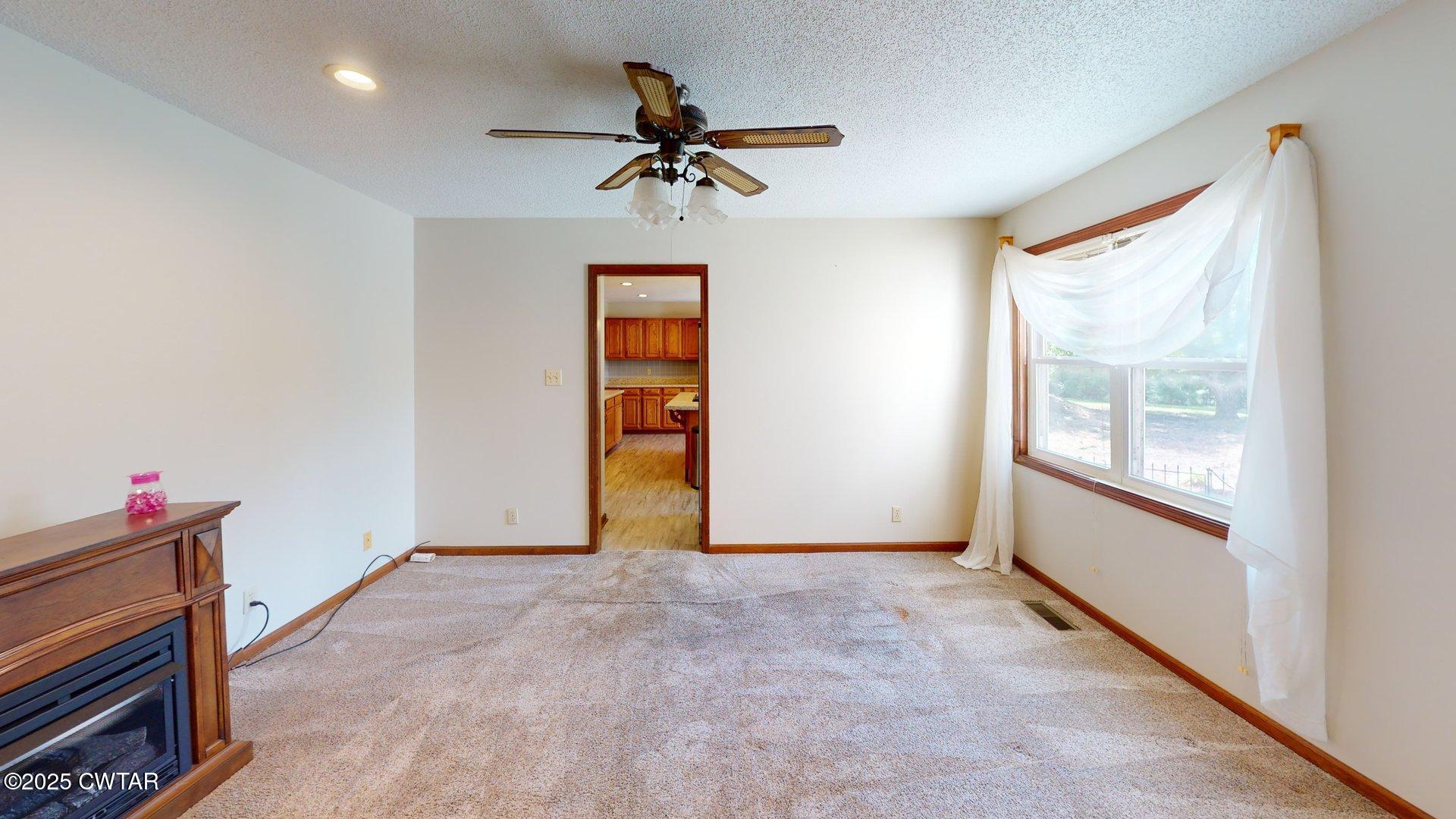 1921 Forrester Road Newbern, TN 38059 - Photo 9 of 18 a view of an empty room with a window