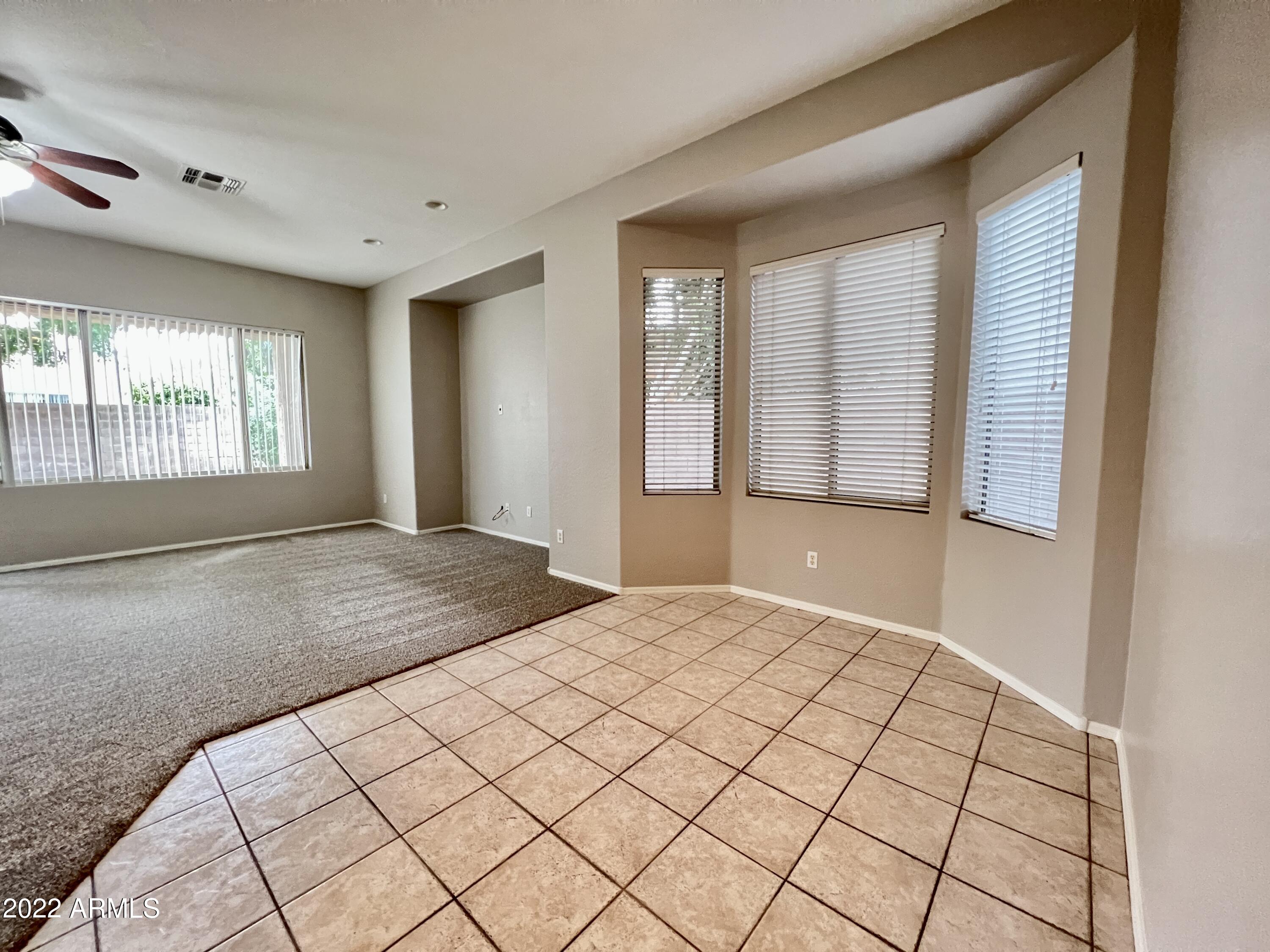 299 West Merrill Avenue Gilbert, AZ 85233 - Photo 9 of 18 a view of an empty room and window