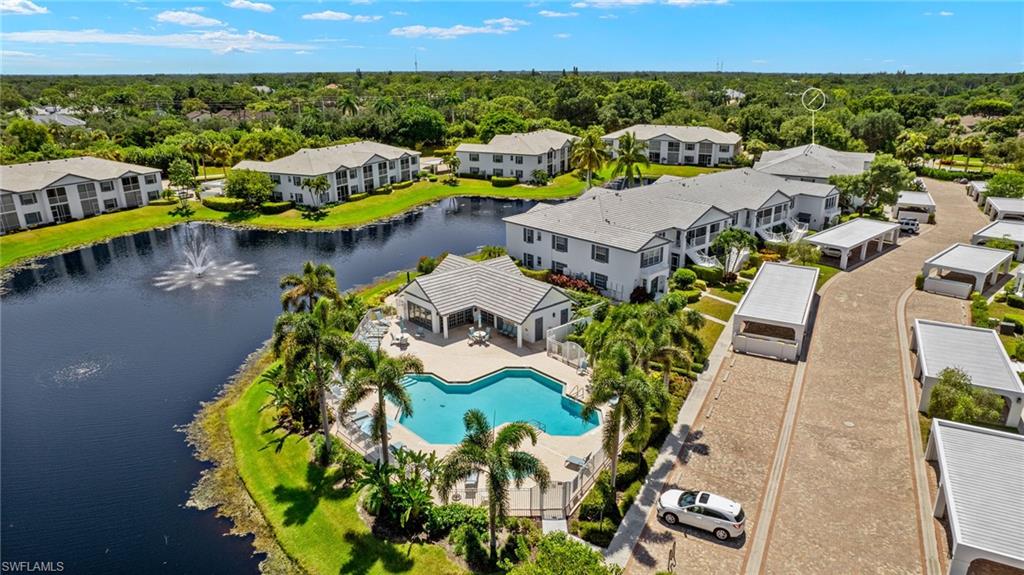 824 Tanbark Drive, Unit 104 Naples, FL 34108 - Photo 17 of 17 an aerial view of residential houses with outdoor space