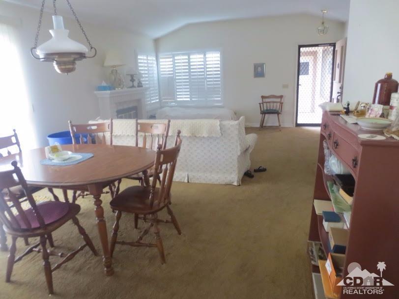 5959 Maybrook Circle Riverside, CA 92506 - Photo 11 of 18 a dining room with furniture and window