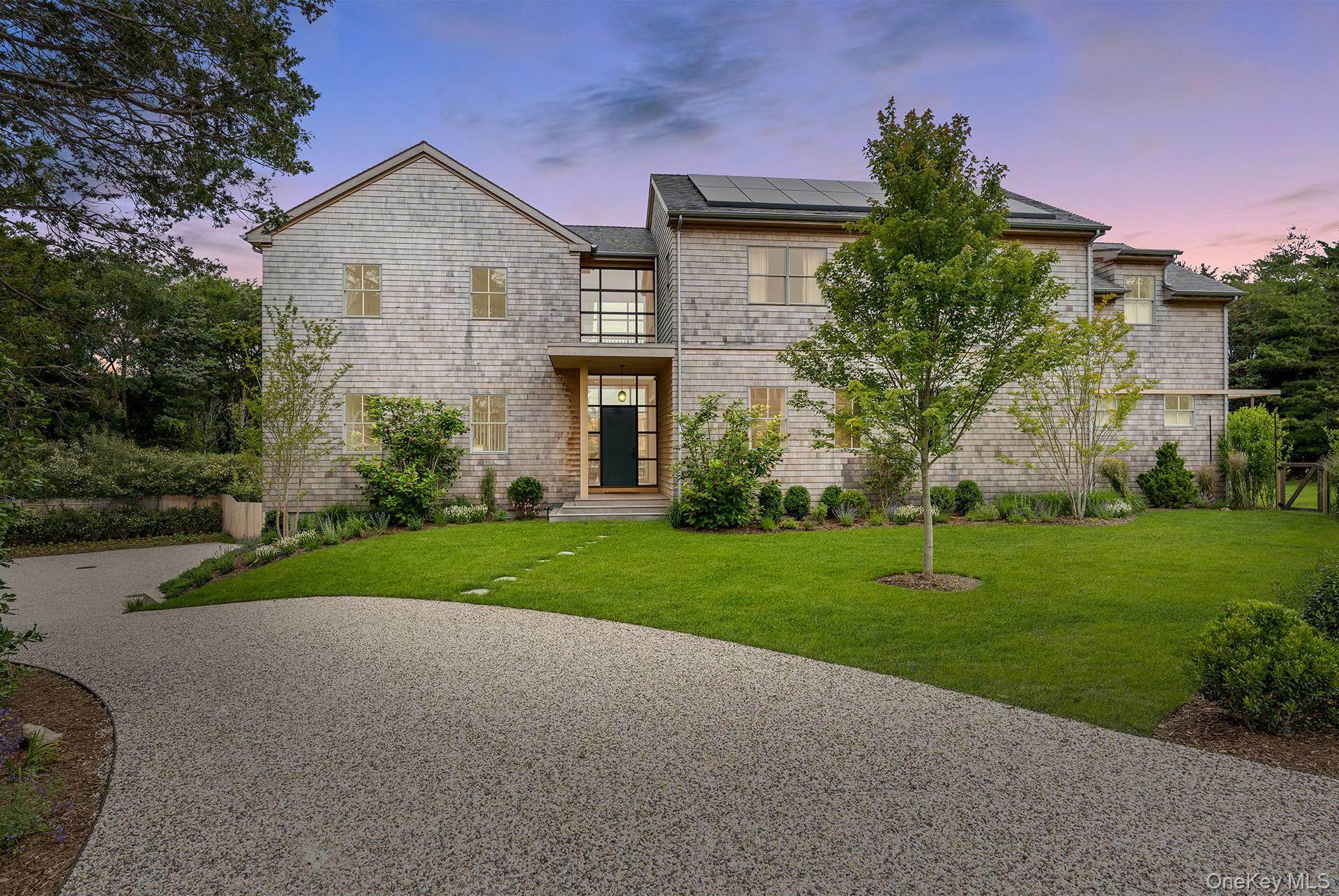 26 Georgian Lane Water Mill, NY 11976 - Photo 1 of 45 front view of a house with a yard